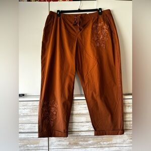 NWT. Style and Co.brown rust colored pants with embroidered flowers in size XXL.